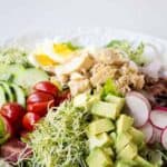 Tuna cobb salad made with fresh veggies, hard boiled eggs, and tuna.