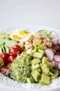 Tuna cobb salad made with fresh veggies, hard boiled eggs, and tuna.