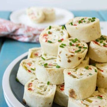 A perfect appetizer for watching the game or for a potluck. These Mexican Tortilla Pinwheels are a crowd pleasing favorite.