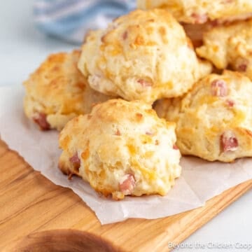 Ham and Cheese Biscuits on a wooden board.