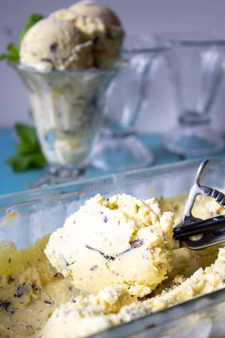 A scoop of mint chocolate chip ice cream.