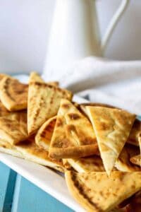 Quick Pita Chips make a delicious snack. These chips are perfect with hummus or just by themselves.