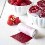 Fresh raspberries turned into delicious and healthy Raspberry Fruit Roll Ups.