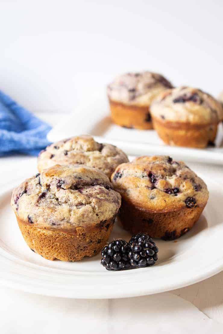 A plateful of homemade blackberry muffins.