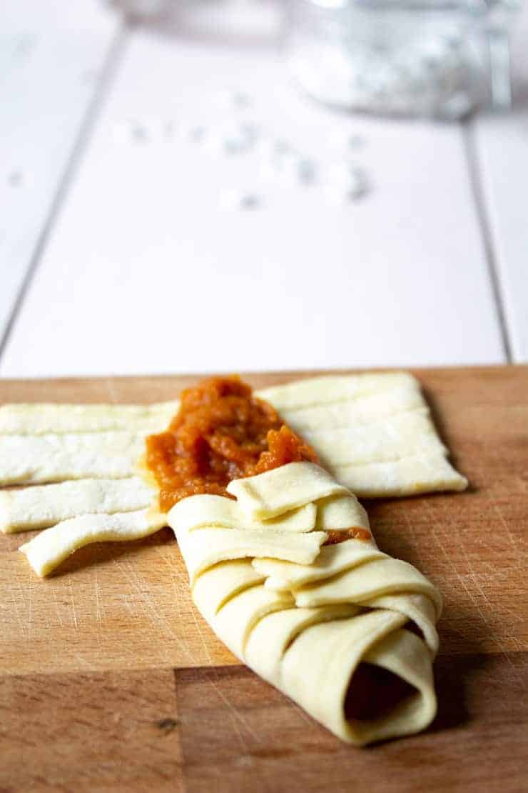 Folding up Mummy Pumpkin Hand Pies