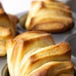 Fan shaped dinner roll in a baking pan.