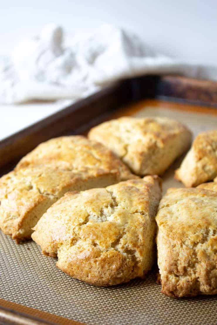 A baking sheet with golden scones. 