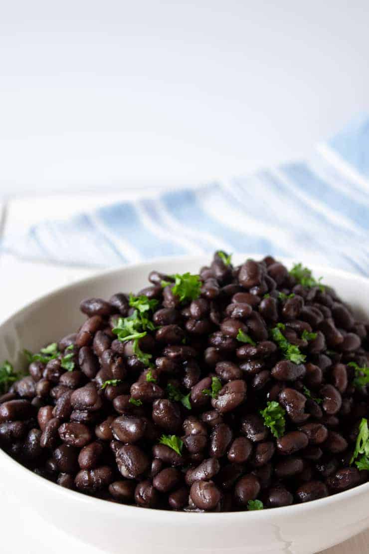 A bowlful of black beans cooked in an Instant Pot.