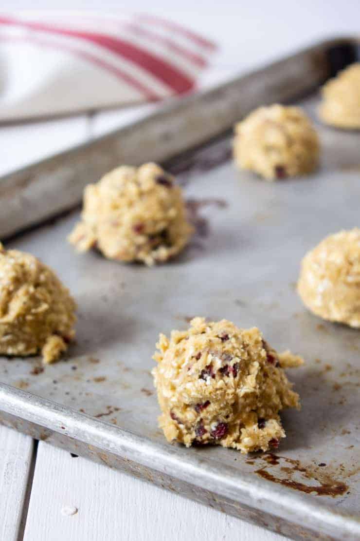 Oatmeal Cranberry Cookie dough on a baking sheet ready for the oven.