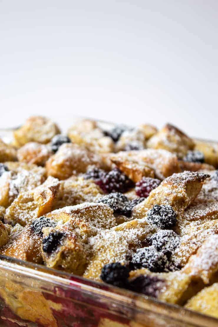 Baked French Toast Casserole topped with powdered sugar.