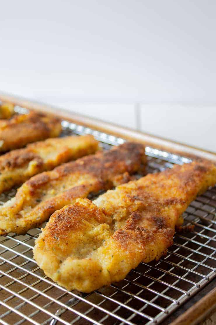 Cooked walleye on a baking rack.