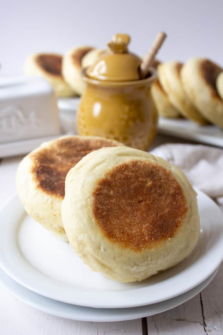 Two English Muffins on a plate.