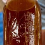 A glass jar full of honey.