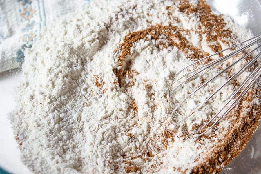 flour swirled with cinnamon and sugar in a large bowl.