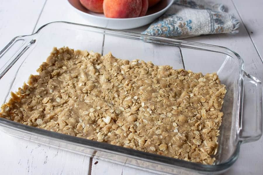 Oatmeal crust in a baking dish.