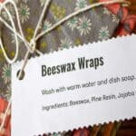 Beeswax wraps folded and stacked and tied together with string.