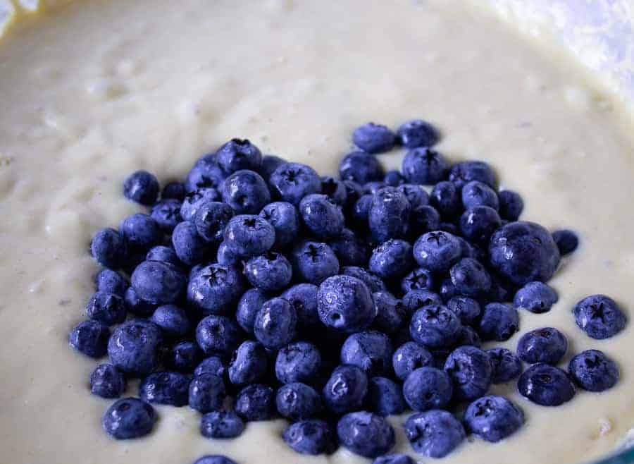 Blueberries added to coffee cake batter.