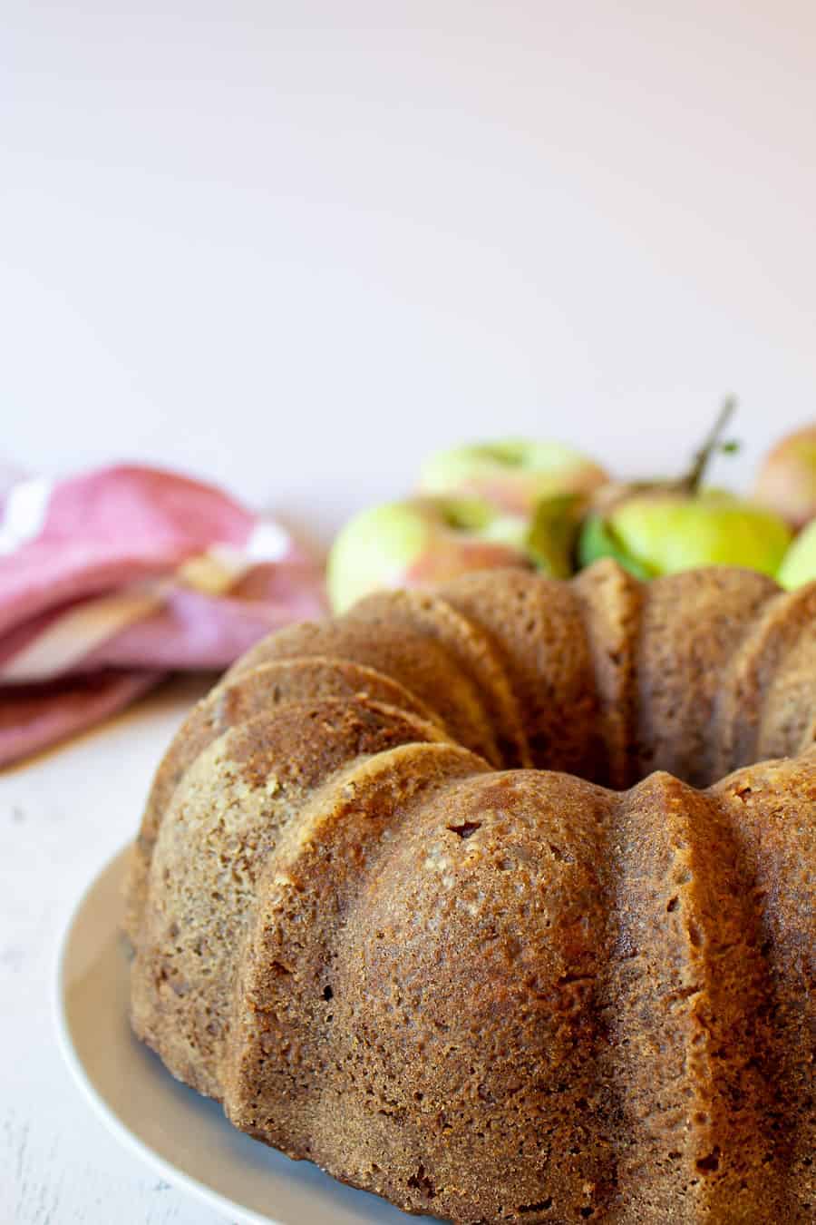 Apple Cake baked into a round bundt cake. 