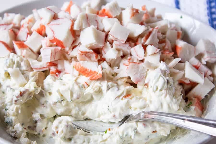 Crab in a bowl with a cream cheese mixture. 