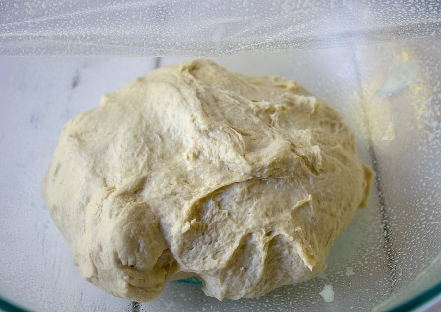 Kneaded bread dough in a bowl. 