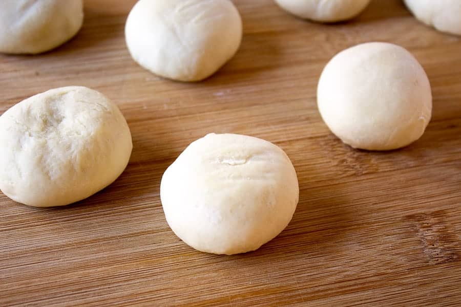 Frozen bread dough shaped into rolls. 