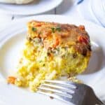 A breakfast casserole filled with eggs, hash browns and sausage.