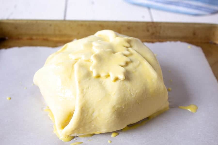 Puff pastry covered with egg wash.