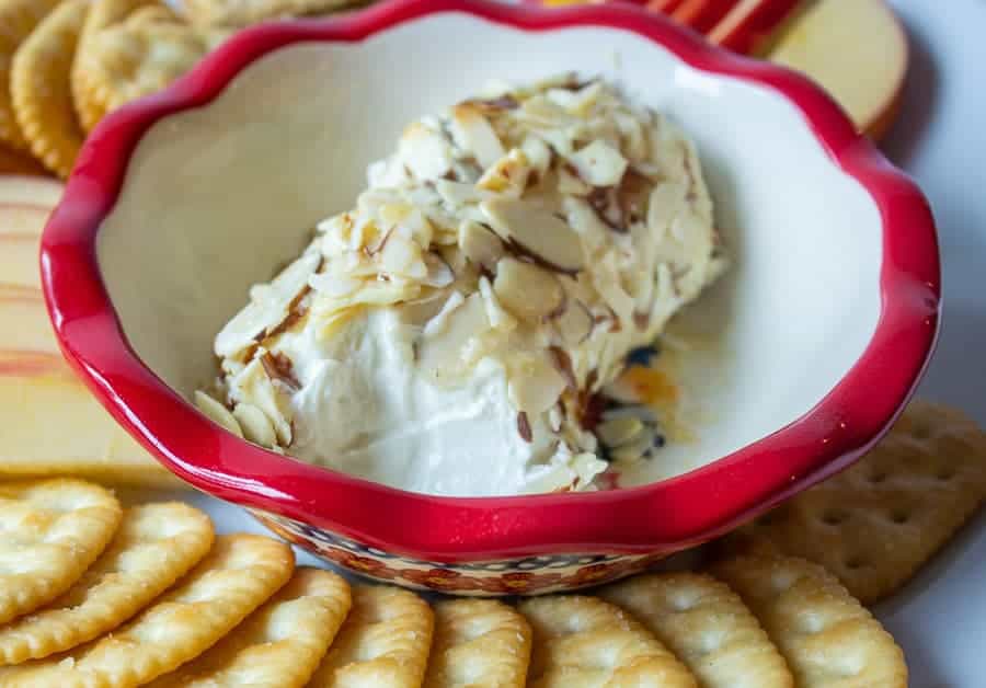 Baked goat cheese topped with sliced almonds and honey.