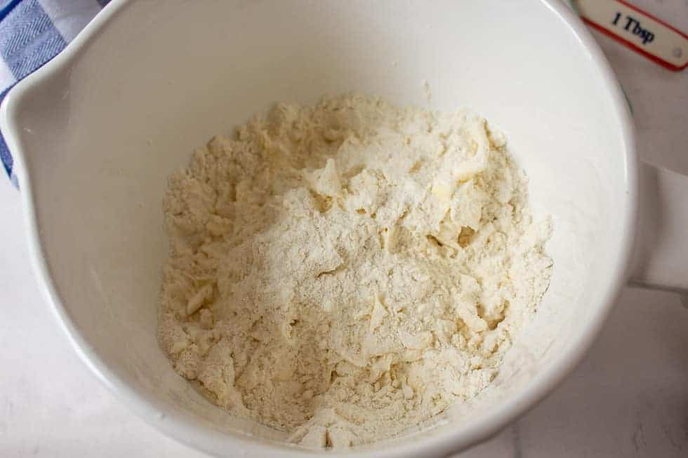 Butter and flour mixed together in a bowl.