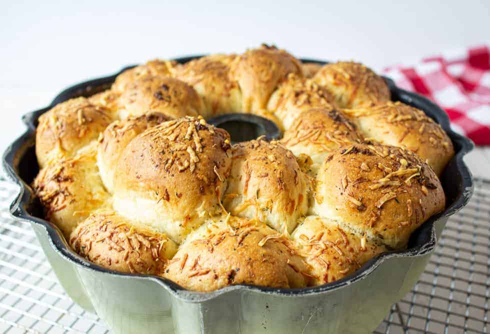 A bundt pan filled with pull apart bread.