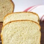 Slices of bread arranged on a wooden board.