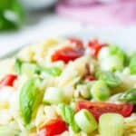 Orzo pasta with asparagus and cherry tomatoes.