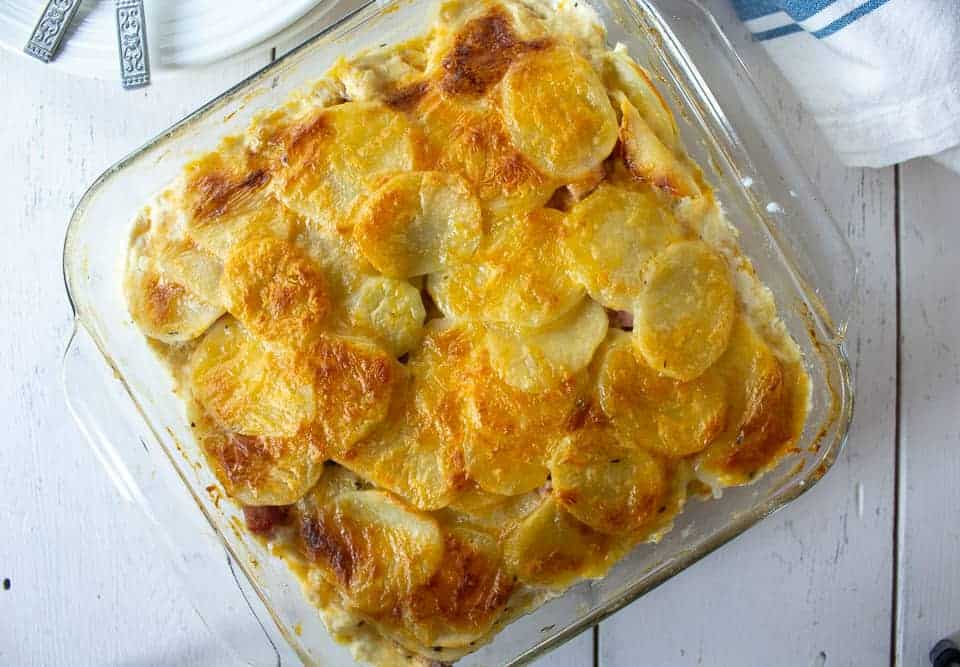 Baked potato casserole with browned cheese on top. 
