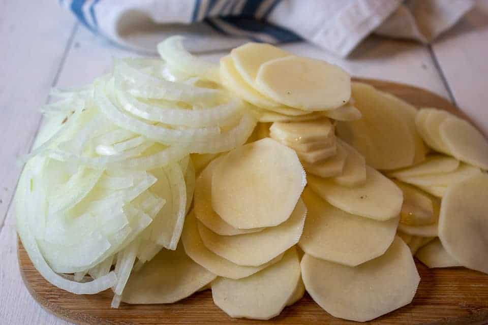 Sliced onions and potatoes.