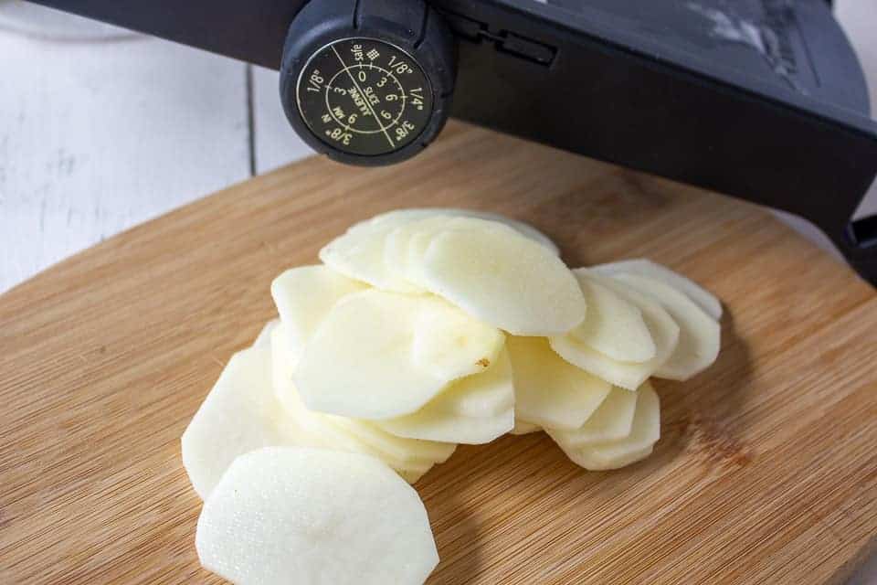 A stack of thinly slice potatoes.