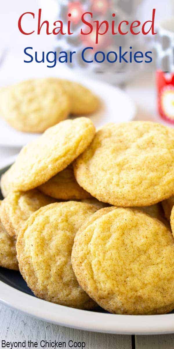 Sugar cookies stacked on a round plate.