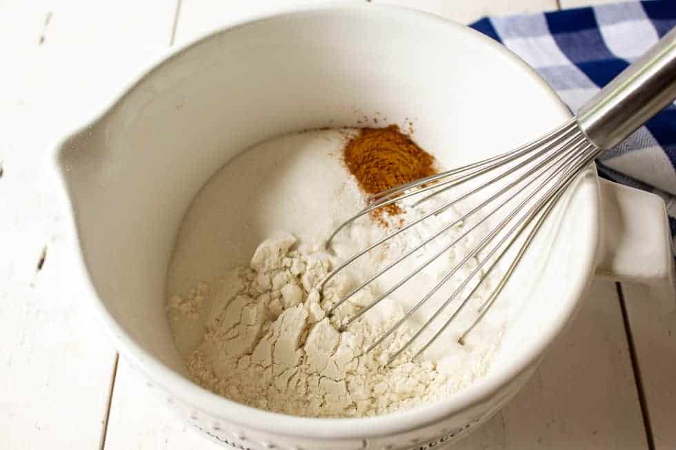 Flour with cinnamon and sugar in a bowl.