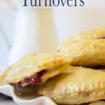 Small hand pies on a white cake stand.