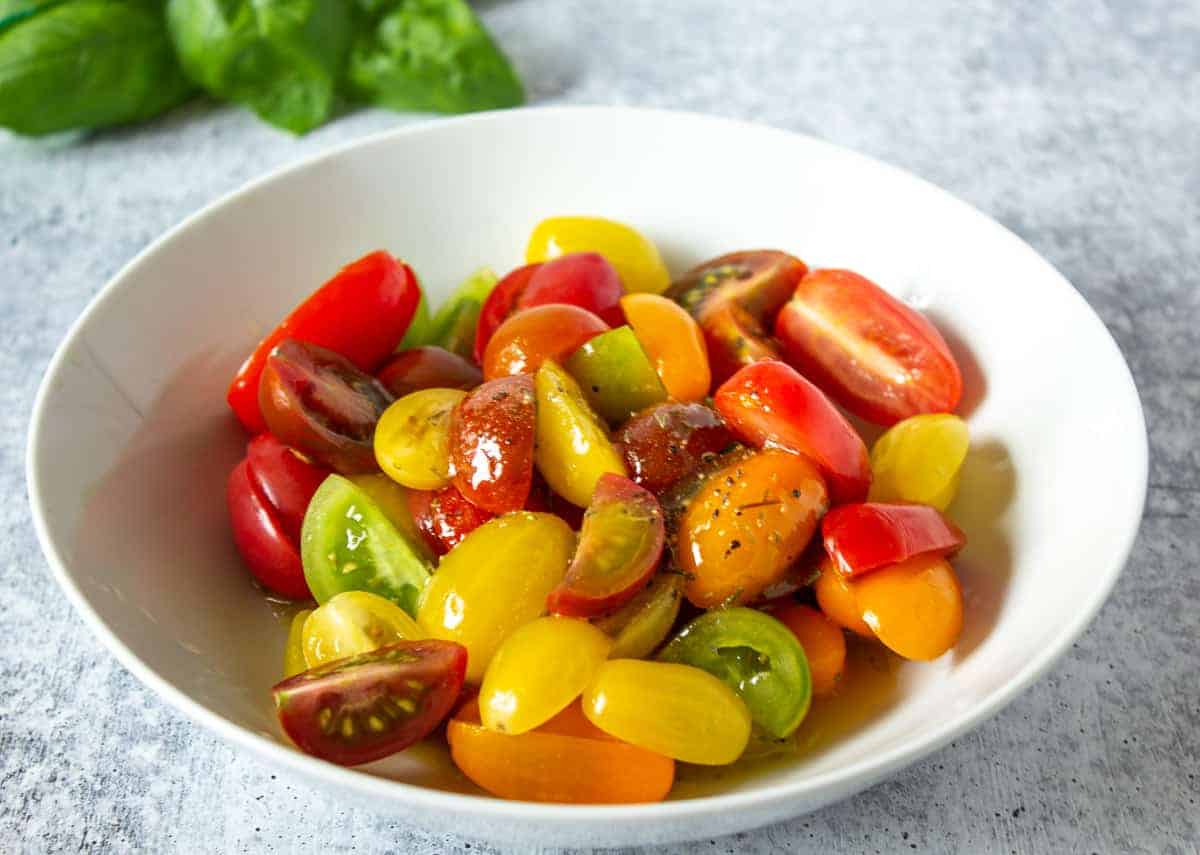 Small cherry tomatoes cut in half and topped with a light dressing.
