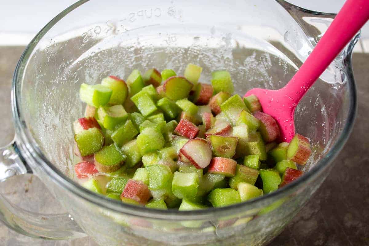 Rhubarb in a bowl with melted sugar.