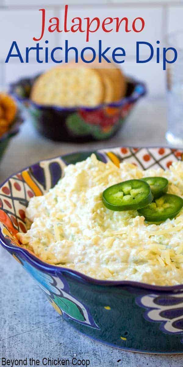 Jalapeno Artichoke Dip in a colorful, Mexican style bowl.