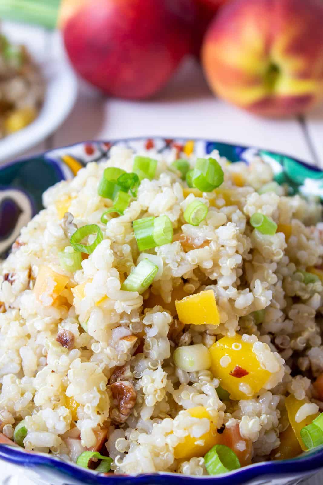 Quinoa and rice salad in a colorful bowl. 