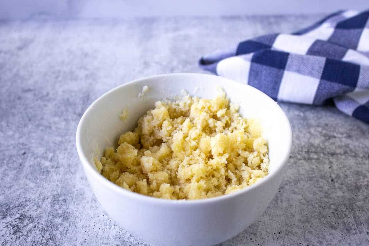 Crumb mixture in a white bowl.