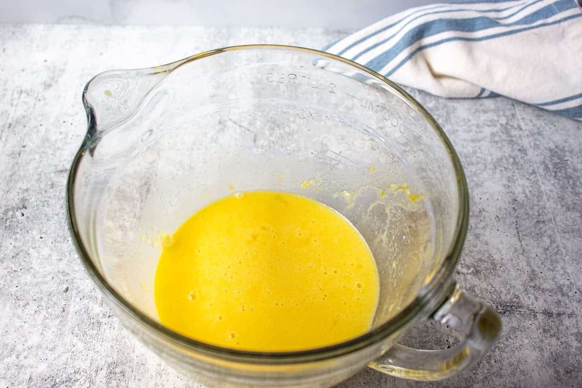 Egg mixture in a glass bowl.