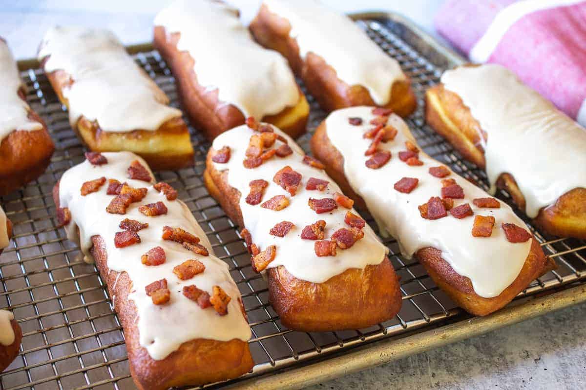 Maple bars with bacon bits sprinkled on top.