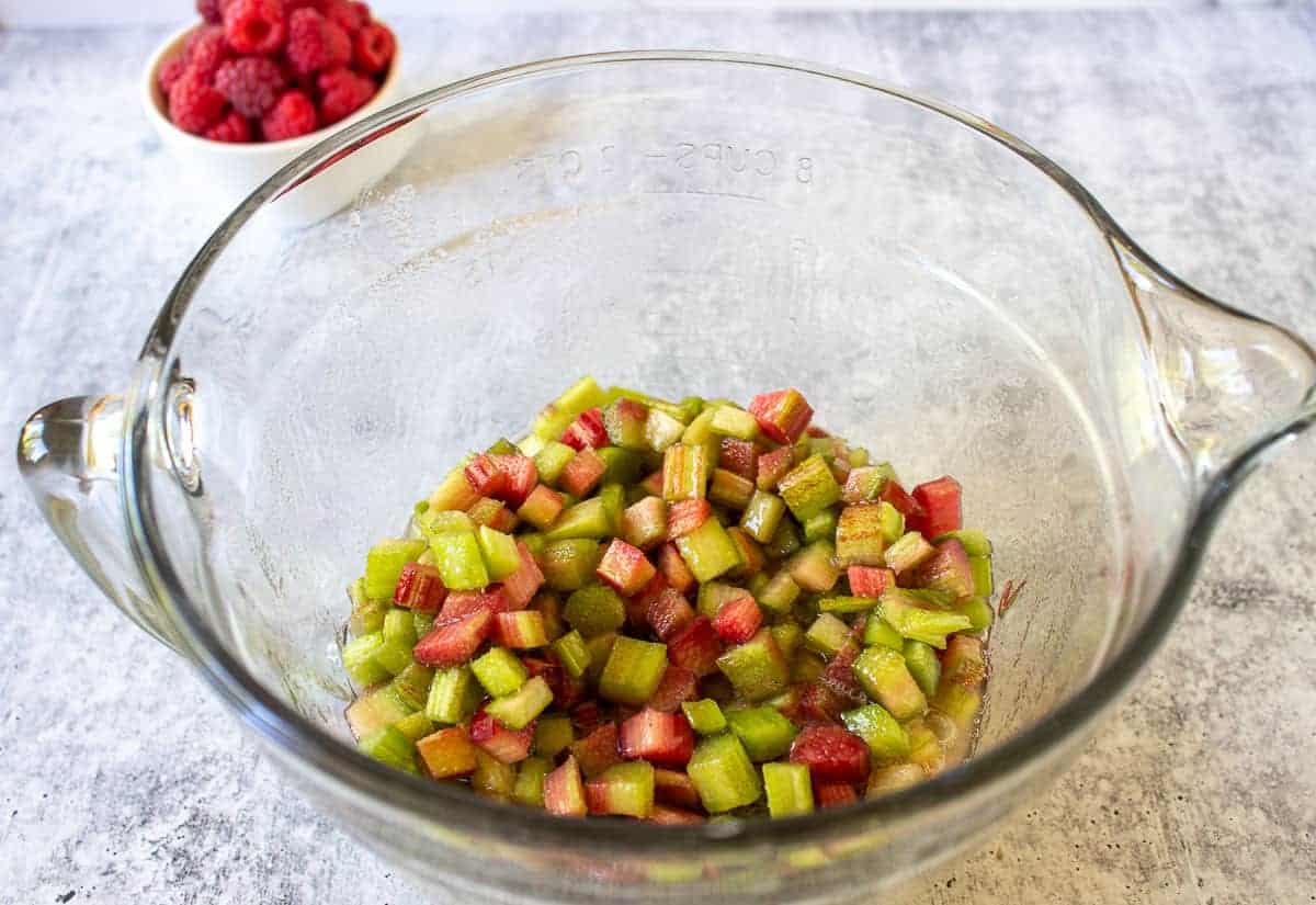 Macerated rhubarb in a glass bowl.