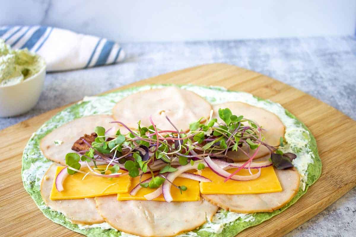 Micro greens piled on the center of a wrap.