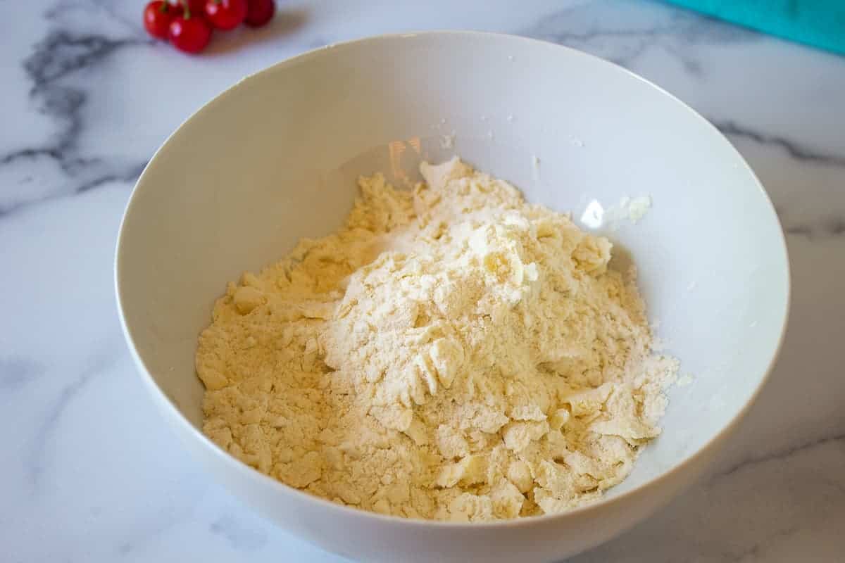 Flour mixture in a white bowl.