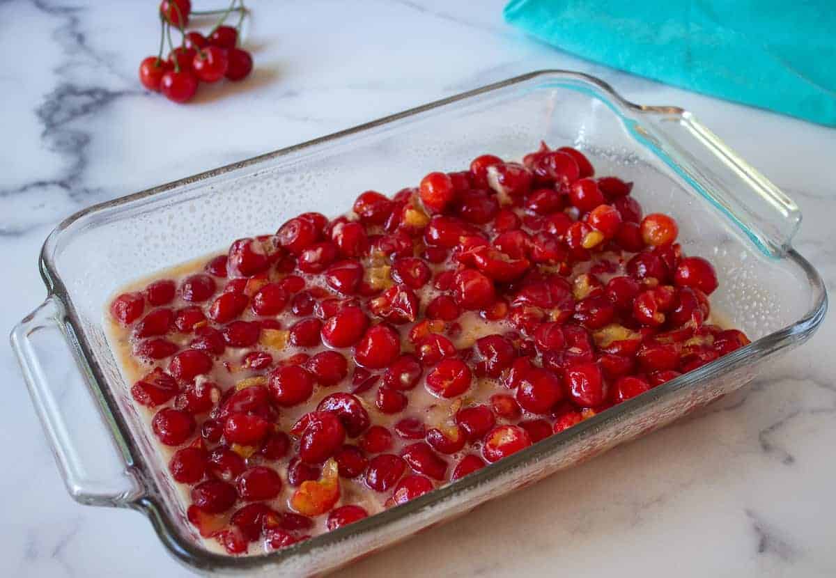 Cherry mixture in a baking dish.