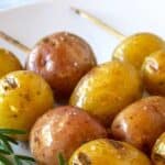 Skewered baby potatoes with fresh rosemary.